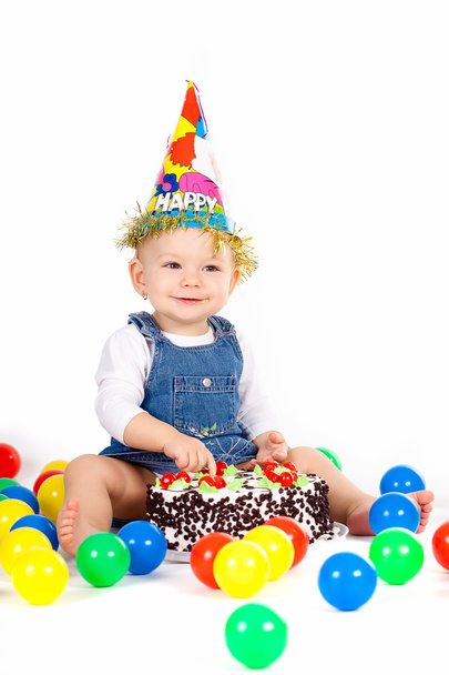 baby girl with hat and cake - Valokuva, kuva