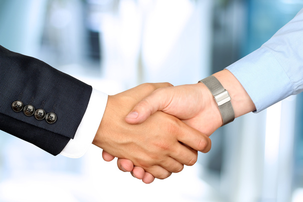 Close-up image of a firm handshake  between two colleagues - Φωτογραφία, εικόνα