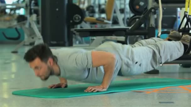 Doing push-ups and ends its program - Footage, Video