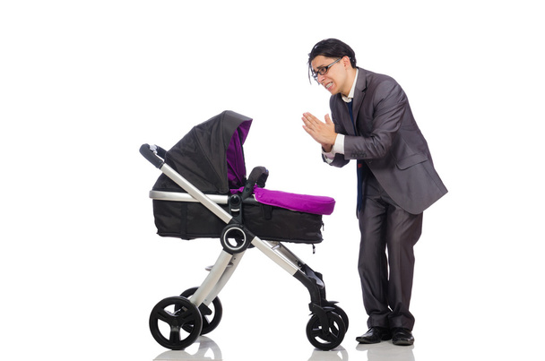 Funny dad with baby and pram on white - Photo, Image