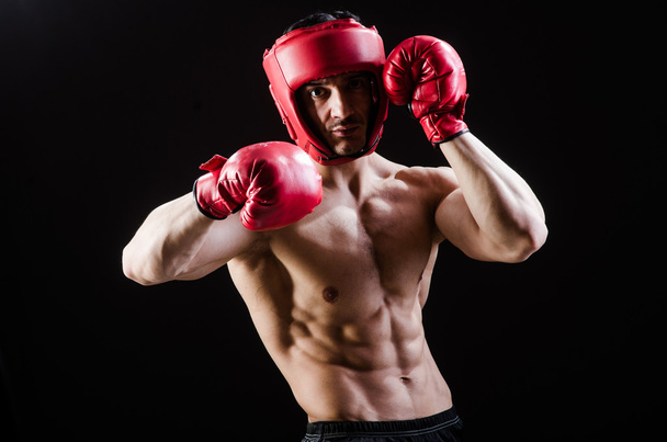 Muscular man in boxing concept - Foto, imagen