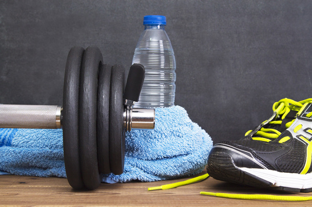 Dumbbell and water - Foto, Bild