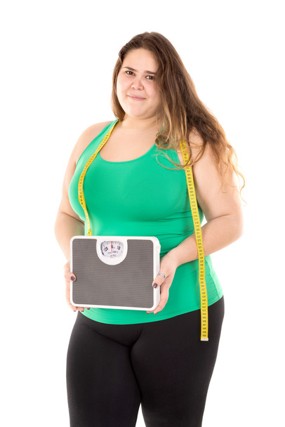 lihava tyttö paino mittakaavassa
 - Valokuva, kuva