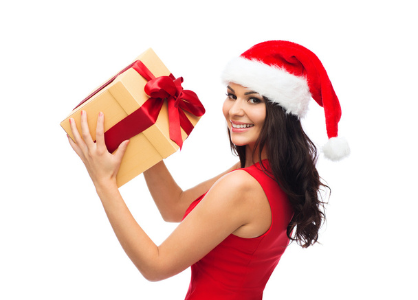 beautiful sexy woman in santa hat with gift box - Foto, imagen