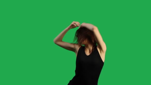 Girl Dancing Isolated on Green - Footage, Video