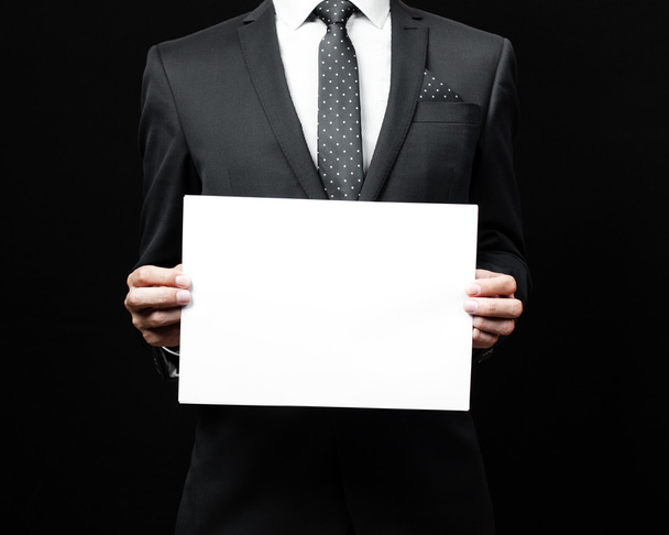 business man holding a paper - Foto, Imagen