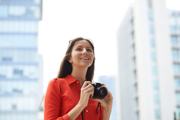 woman taking photos outdoors - Photo, Image