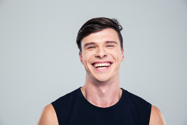 Portrait of a cheerful man looking at camera - Photo, Image