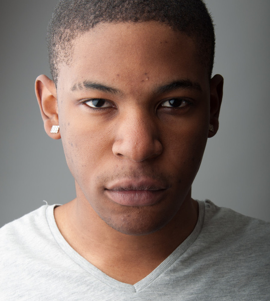 Close up Headshot portrait of a handsome black man - Photo, Image
