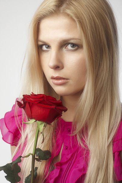 beautiful young women with red rose - Photo, Image