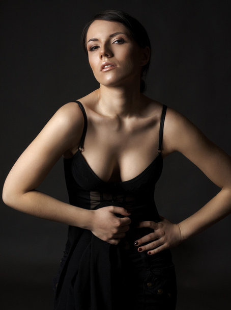 beautiful sexy young woman on black background - Zdjęcie, obraz