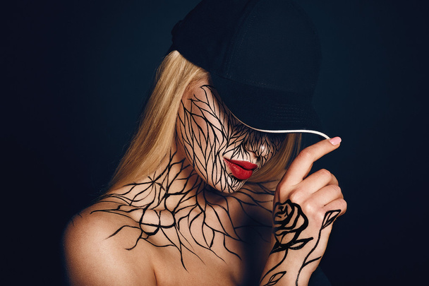 fashion portrait of girl with faceart - Photo, Image