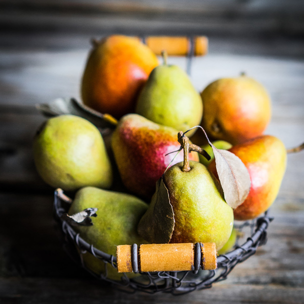 Autumn pears on rustic wooden background - Photo, Image