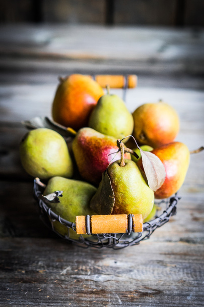 Autumn pears on rustic wooden background - Photo, Image