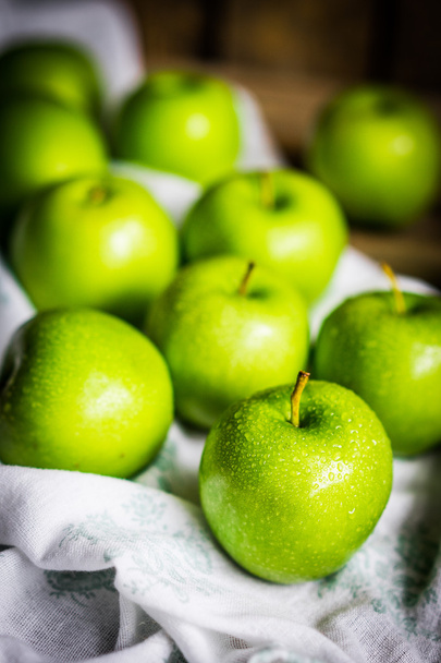 Bright green apples on wooden background - Fotoğraf, Görsel