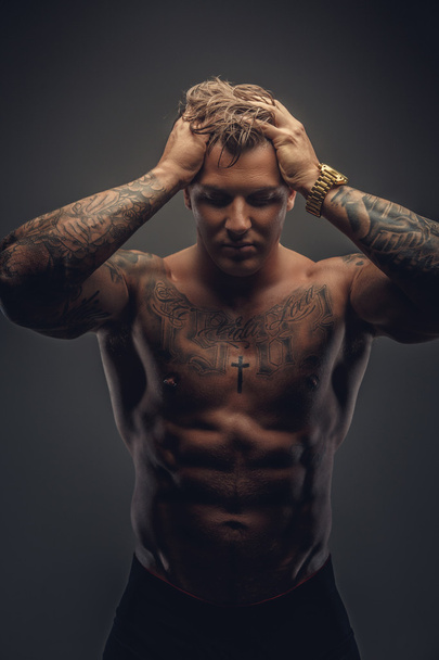 Strong shirtless tattooed man. - Fotó, kép