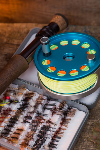 fly-fishing tackles on wooden boards - Photo, Image