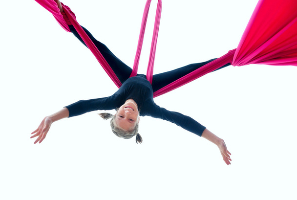 cheerful child training on aerial silks - Foto, Bild