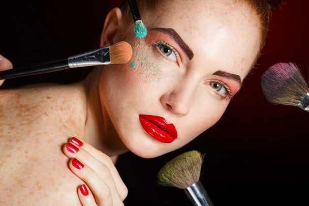 Professional colorful makeup for red-haired models - Photo, Image