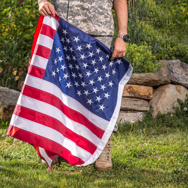 American soldier with a flag - Fotoğraf, Görsel