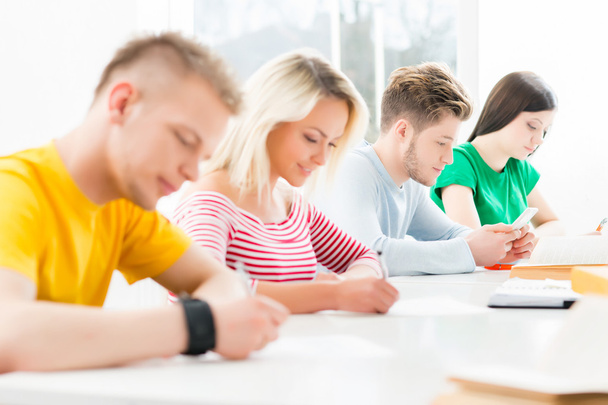 teenage students in classroom - Zdjęcie, obraz