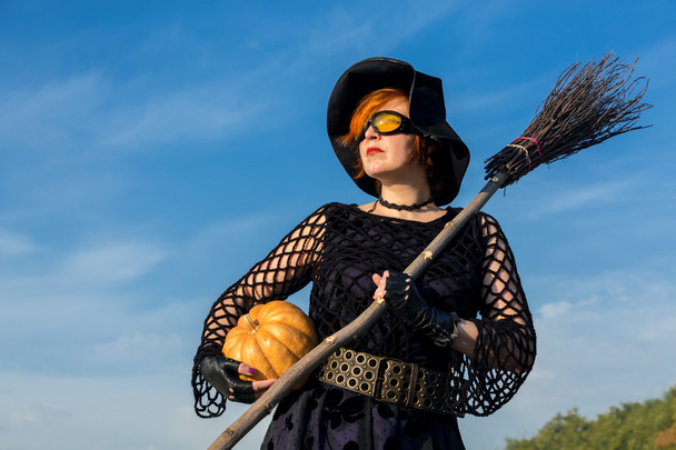 Portrait of Halloween Theme Dressed Lady on Blue Sky Background - Zdjęcie, obraz