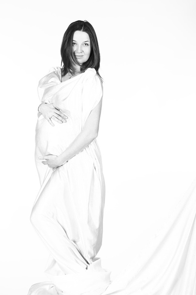 Kobieta w ciąży w białych ubraniach - Zdjęcie, obraz