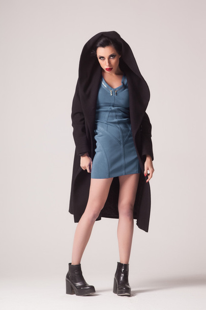 Beautiful sexy woman in a black coat for autumn winter fashion - Foto, imagen
