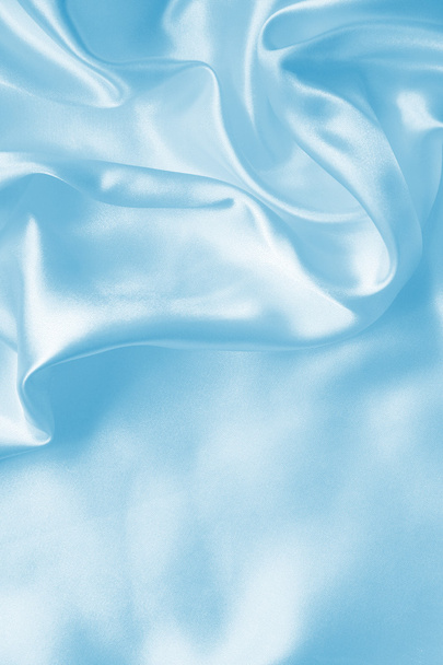 Smooth elegant blue silk or satin as background - Фото, изображение