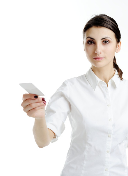 Woman holding blank businesscard in hand - 写真・画像