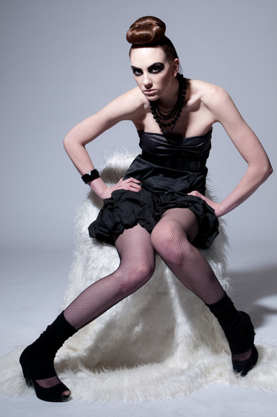 Beautiful fashion model with black make-up - Foto, Imagem