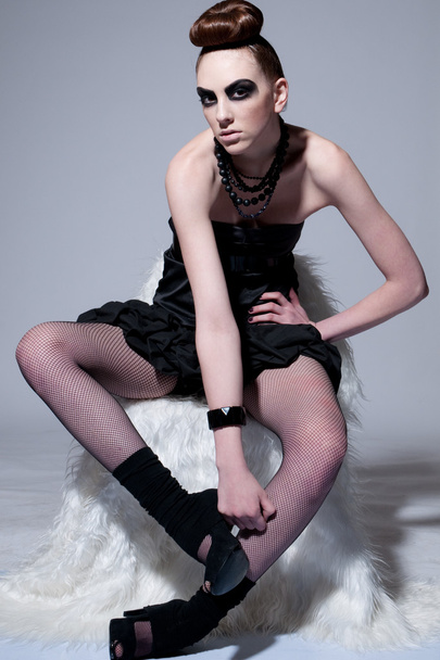 Beautiful fashion model with black make-up - Fotografie, Obrázek