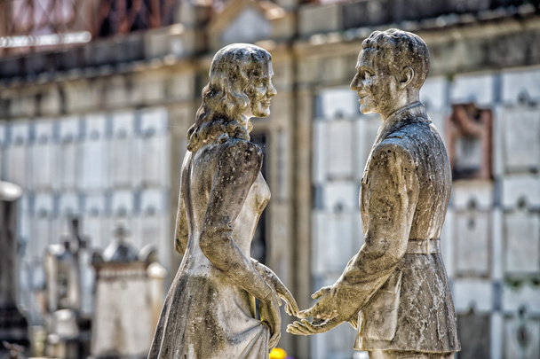 young lovers while smiling marble statue - Photo, Image