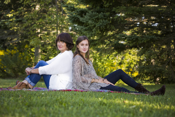mother and daughter in park - Photo, Image