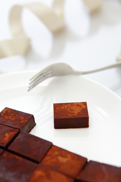 Delicious handmade sweet chocolate with metal fork - Foto, Bild