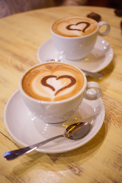 Coffee cup with milk and heart shape - Φωτογραφία, εικόνα