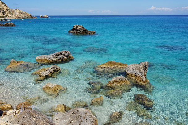 Rock in the water of Agios Nikitas Beach, Lefkada, Ionian Islands - Fotoğraf, Görsel