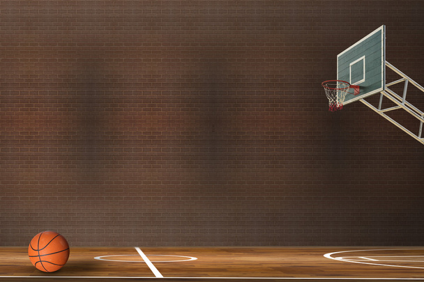 Μπάλα μπάσκετ πάνω από το γήπεδο μπάσκετ του σκληρού ξύλου - Φωτογραφία, εικόνα
