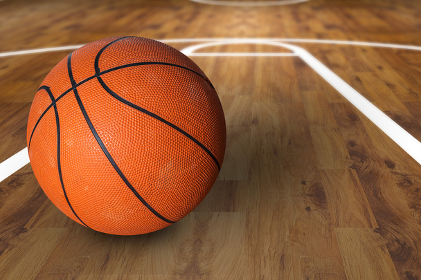 Bola de basquete sobre quadra de basquete de madeira dura
 - Foto, Imagem