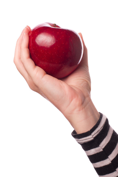 Woman holding organic red delicious apple - Фото, изображение