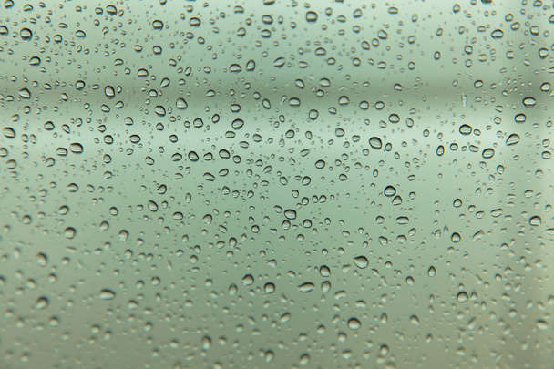gouttes de pluie sur fond de verre - Photo, image