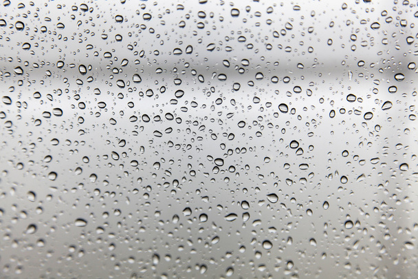Gotas de chuva no fundo de vidro
 - Foto, Imagem