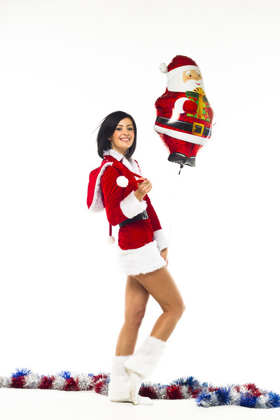 Beautiful young woman dressed as Santa Claus on a white backgrou - Foto, Bild