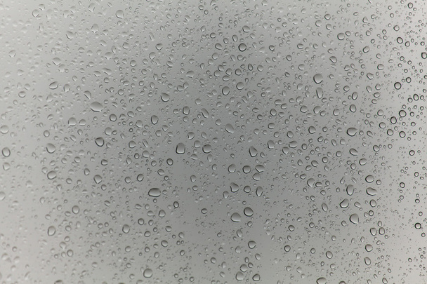 kapky deště na skleněném pozadí - Fotografie, Obrázek