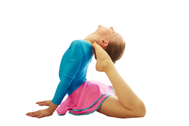 young  girl doing gymnastics exercises - Foto, imagen