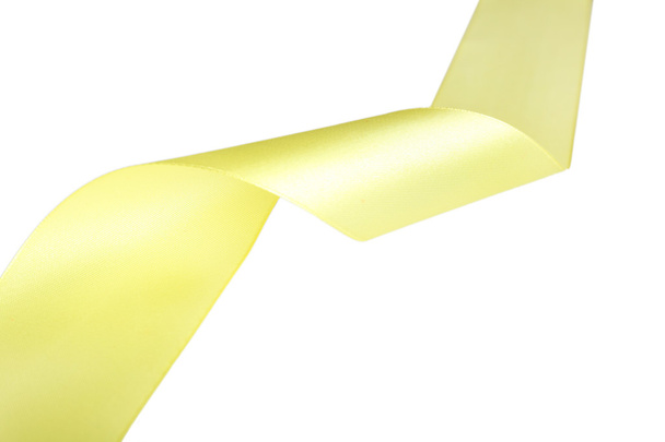 Yellow ribbon isolated on white - Photo, image