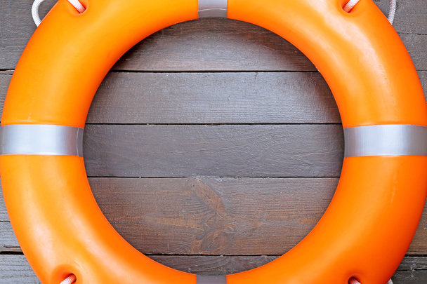 A life buoy on wooden wall - Foto, Bild