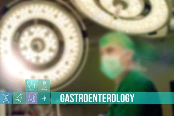 Gastroenterologia imagem conceito médico com ícones e médicos em segundo plano
 - Foto, Imagem
