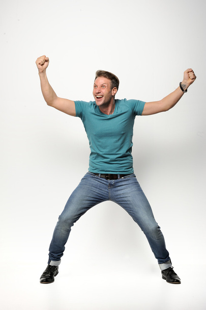 man screaming mouth open, wear casual blue shirt, isolated white background, concept face emotio - Foto, afbeelding