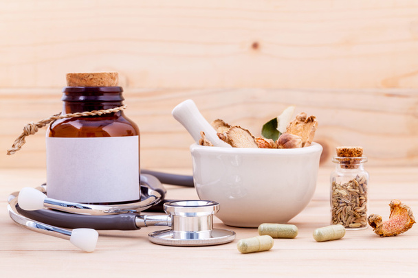 Capsule of herbal medicine alternative healthy care with stethos - Foto, Imagen